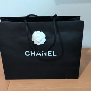 Chanel Black Tote with White Flower Accent